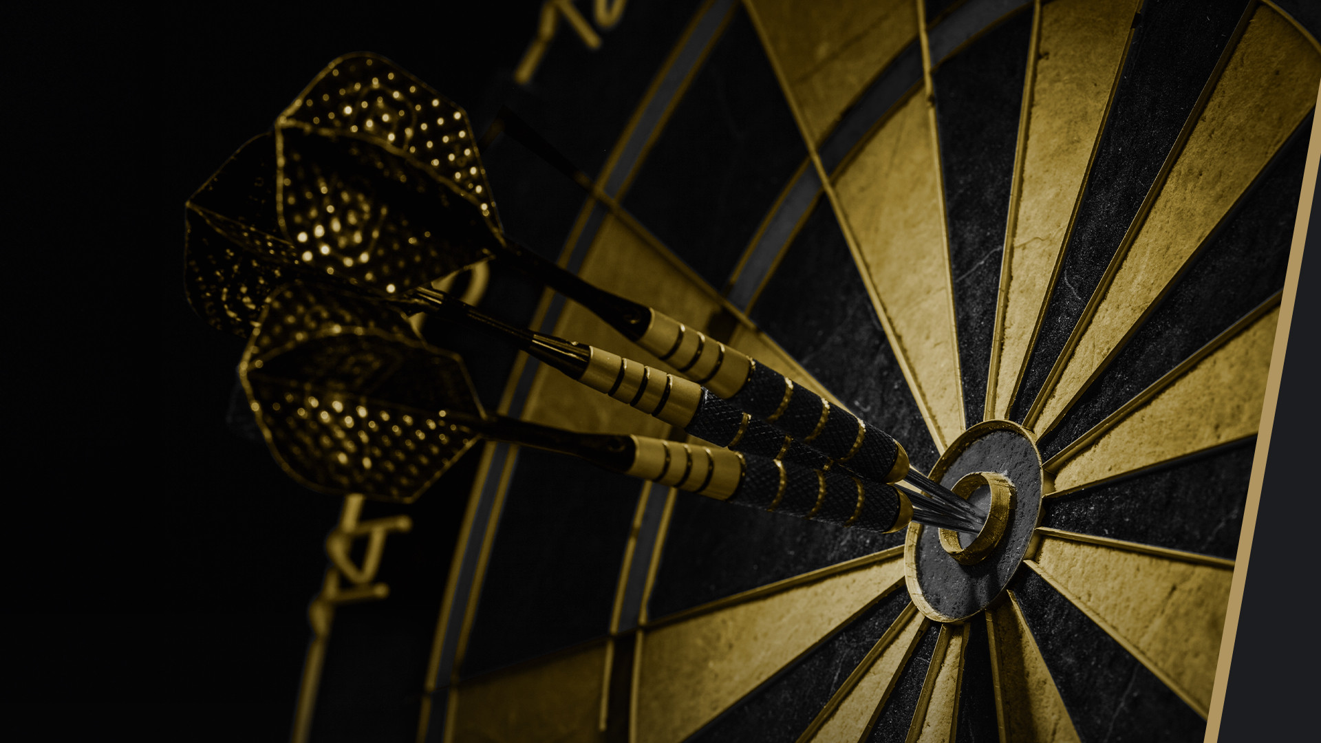 Close-up of a dartboard with several darts clustered around the bullseye and the BetMGM logo prominently displayed.